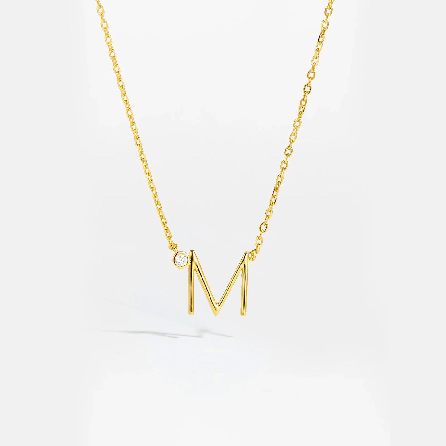 Golden Initial Charm Necklace - MAURÉ