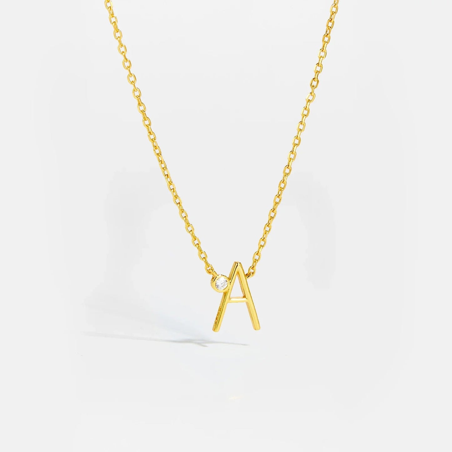 Golden Initial Charm Necklace - MAURÉ