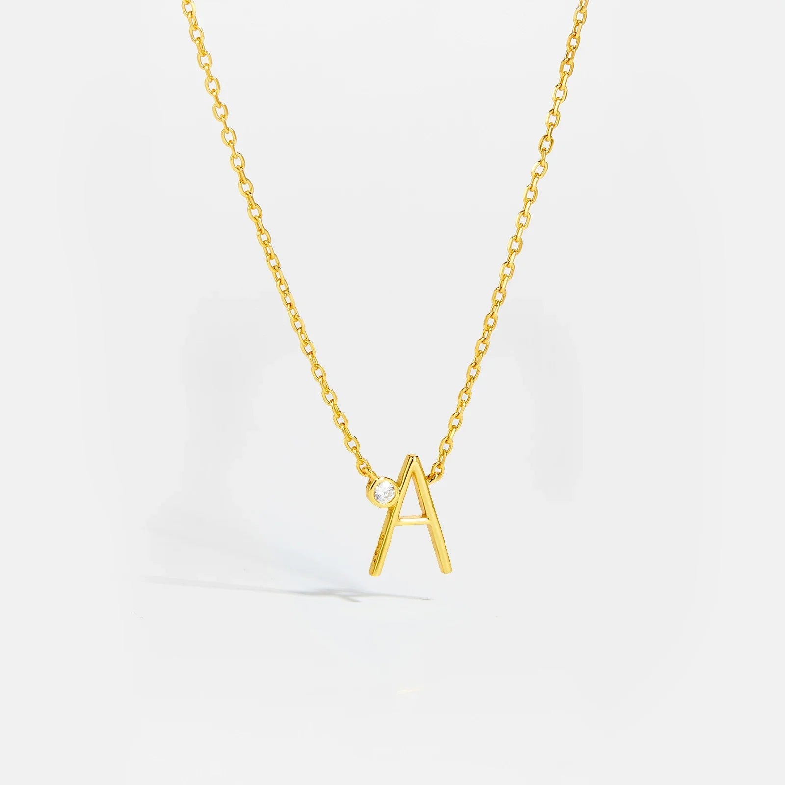 Golden Initial Charm Necklace - MAURÉ