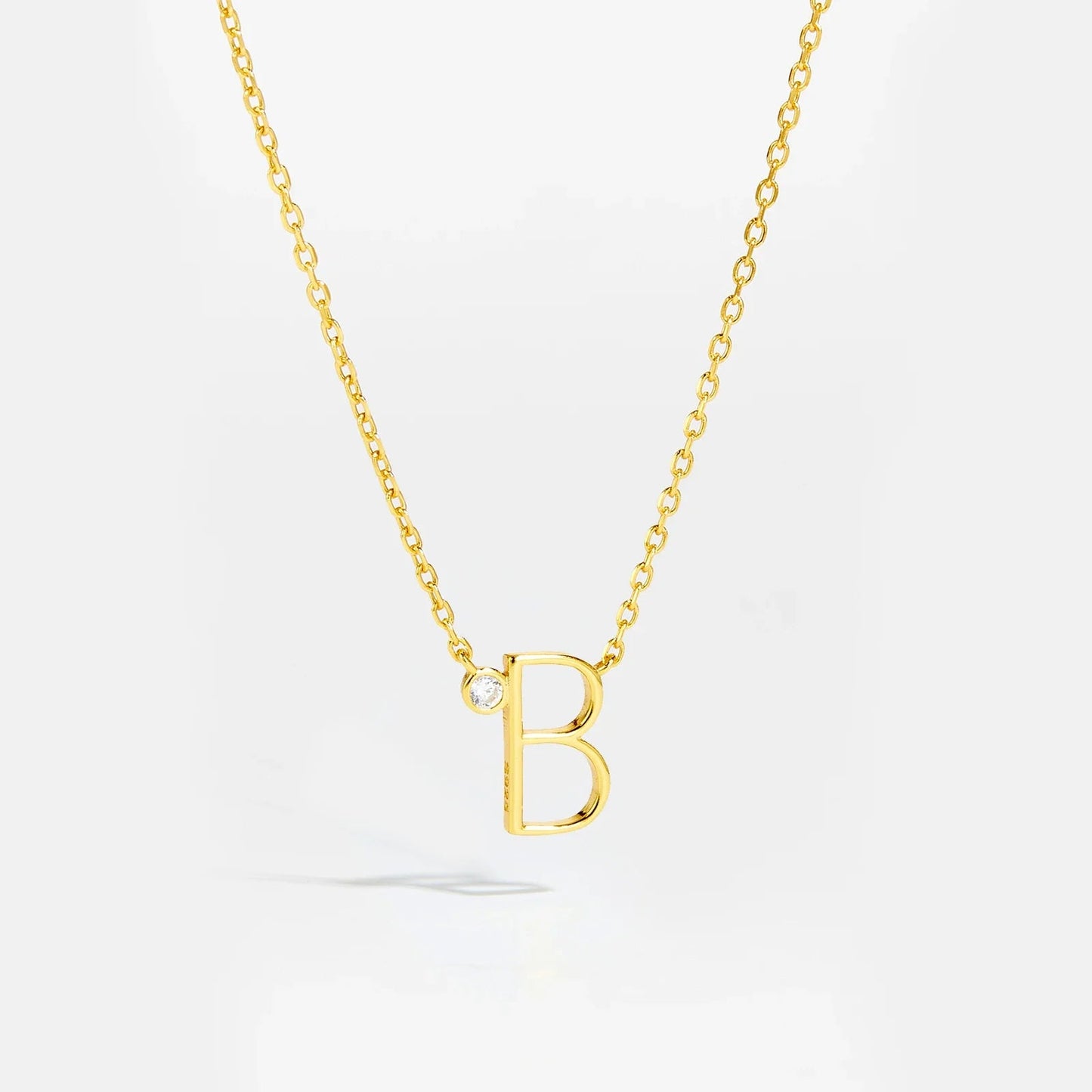 Golden Initial Charm Necklace - MAURÉ