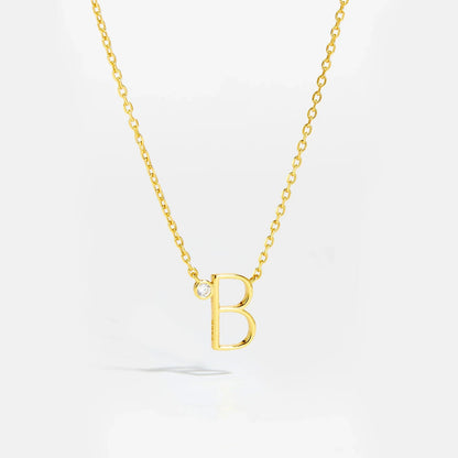 Golden Initial Charm Necklace - MAURÉ