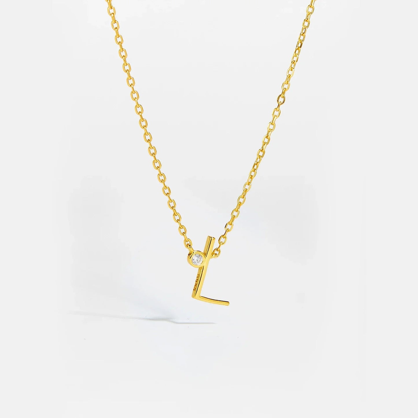 Golden Initial Charm Necklace - MAURÉ