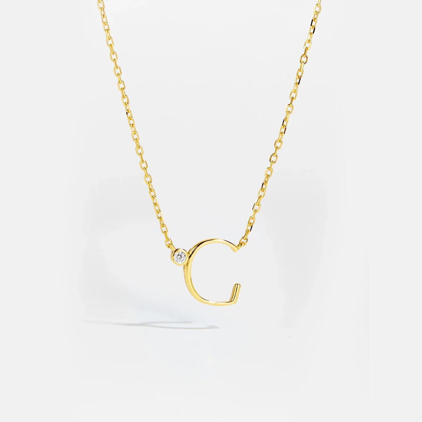 Golden Initial Charm Necklace - MAURÉ