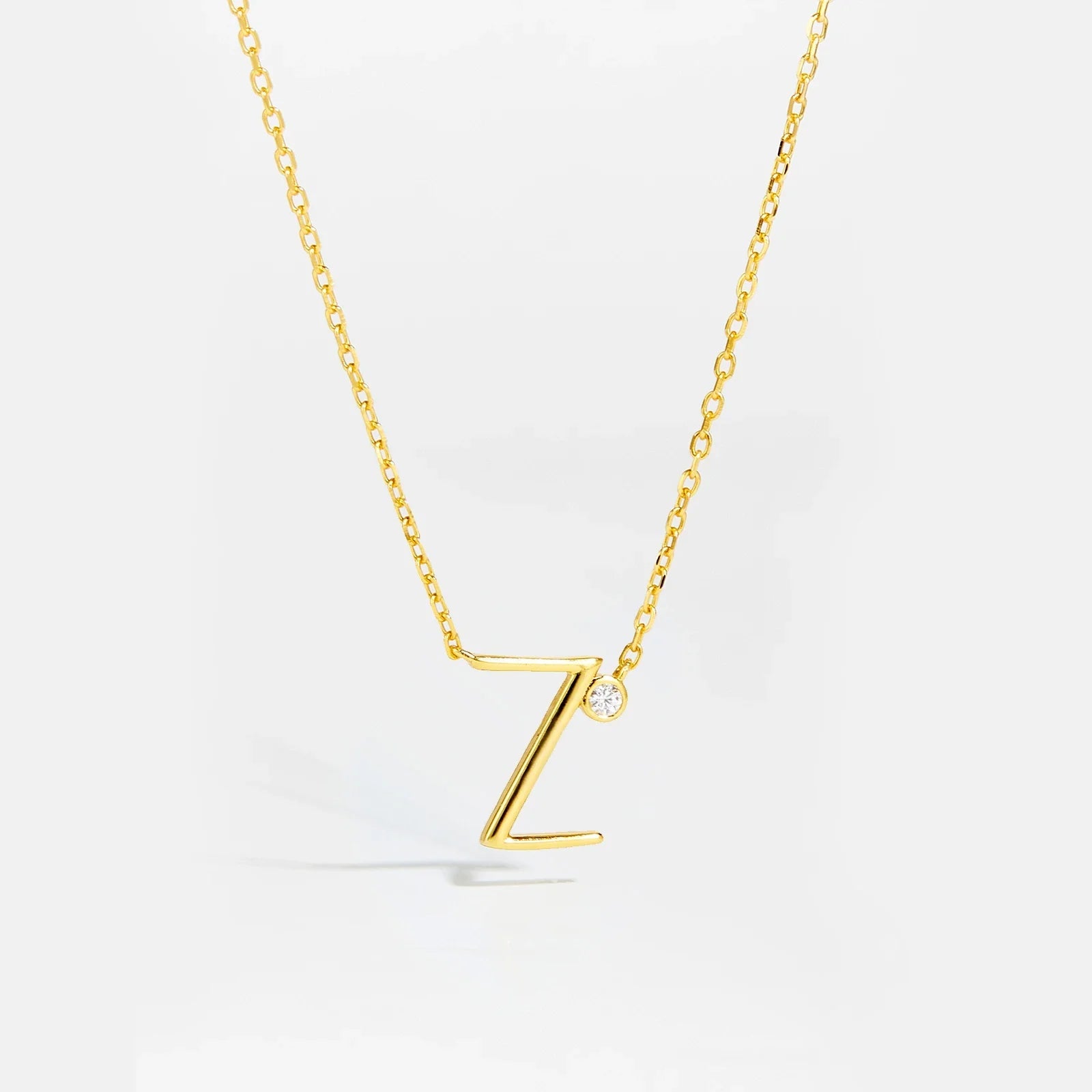 Golden Initial Charm Necklace - MAURÉ