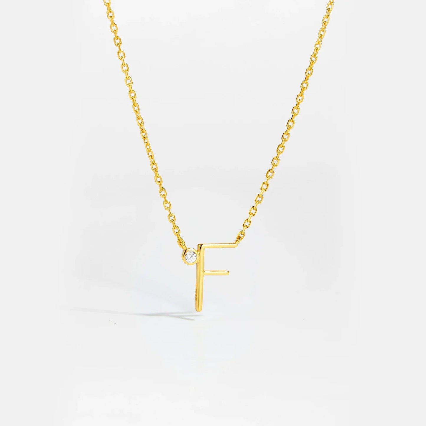 Golden Initial Charm Necklace - MAURÉ