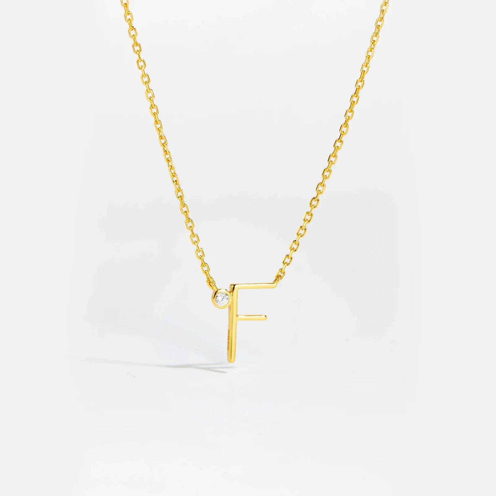 Golden Initial Charm Necklace - MAURÉ