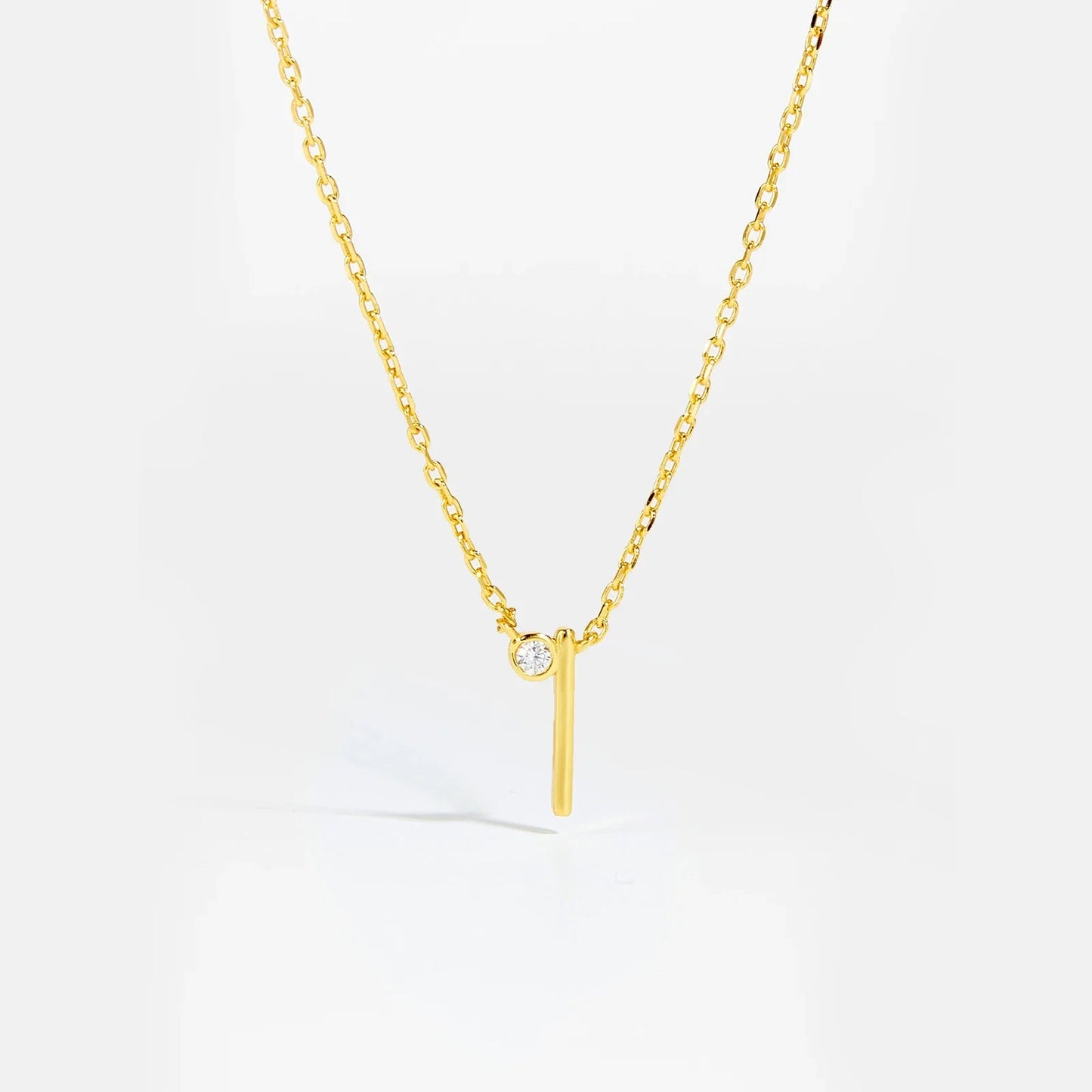 Golden Initial Charm Necklace - MAURÉ